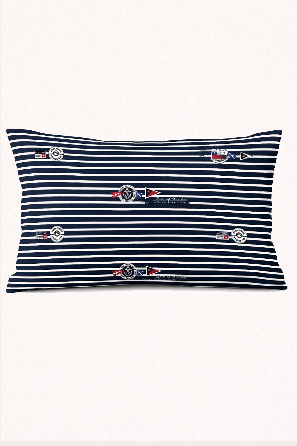 Nautical-themed bedroom with striped pillows and decorative items on a shelf.