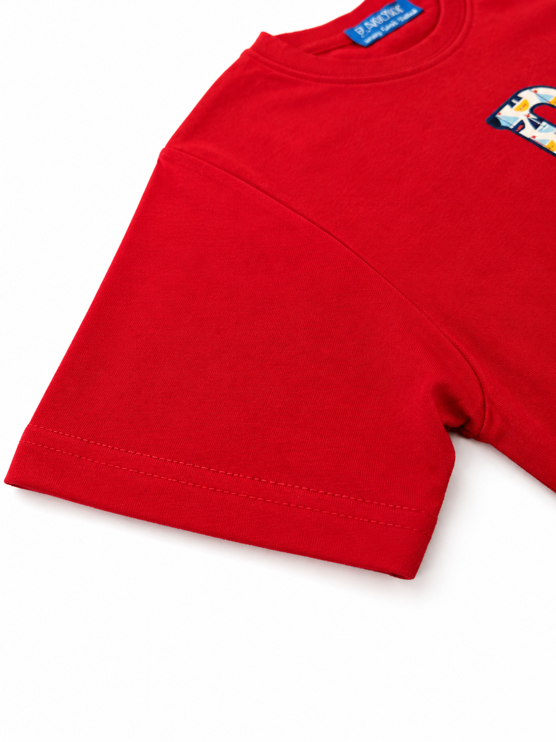 Red t-shirt with a colorful logo on a white background