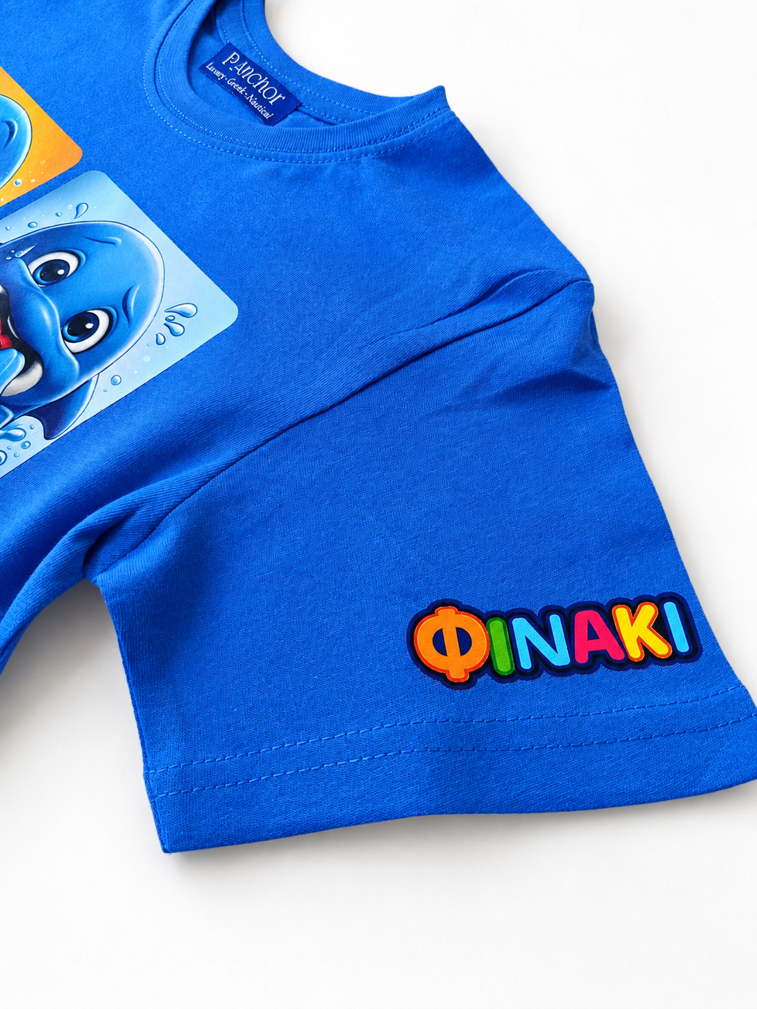 Blue children's t-shirt with a cartoon character and colorful text on a white background