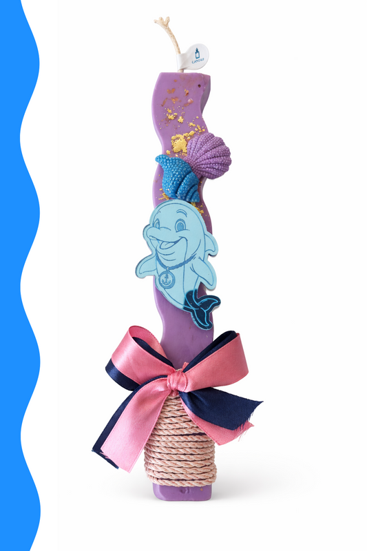 Decorative item with a dolphin design, pink ribbon, and purple base on a white background.