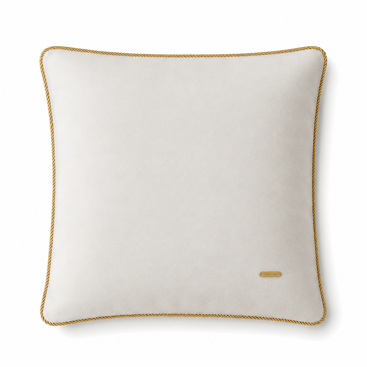 White pillow with gold trim on a white background