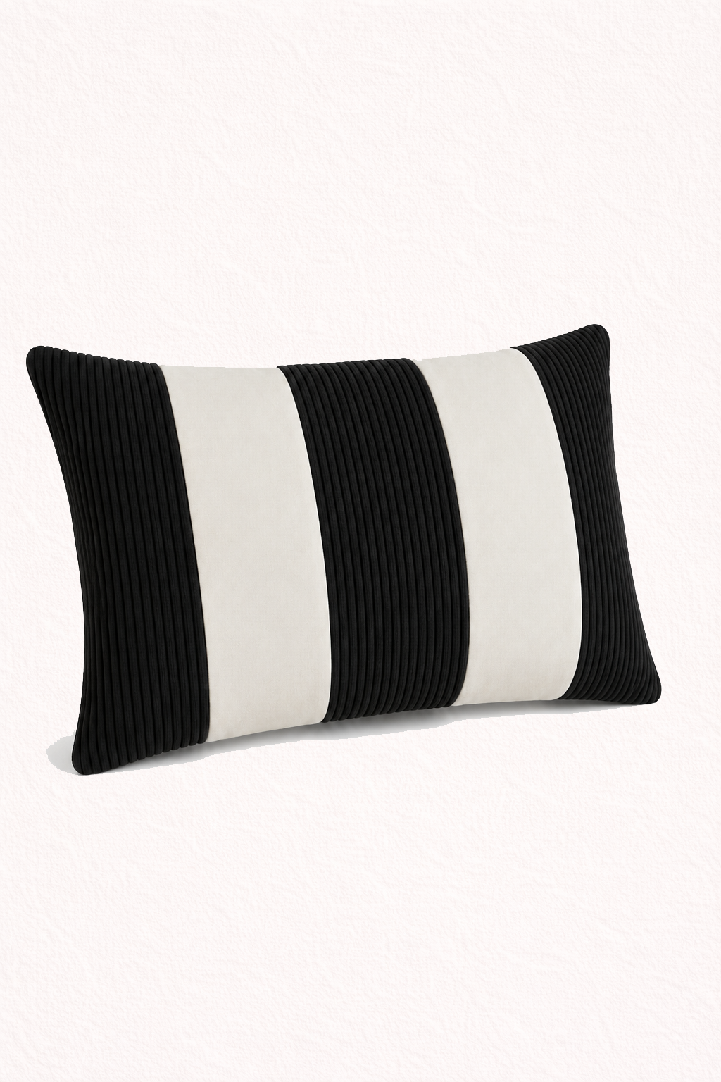 Black and white striped pillow on a white background