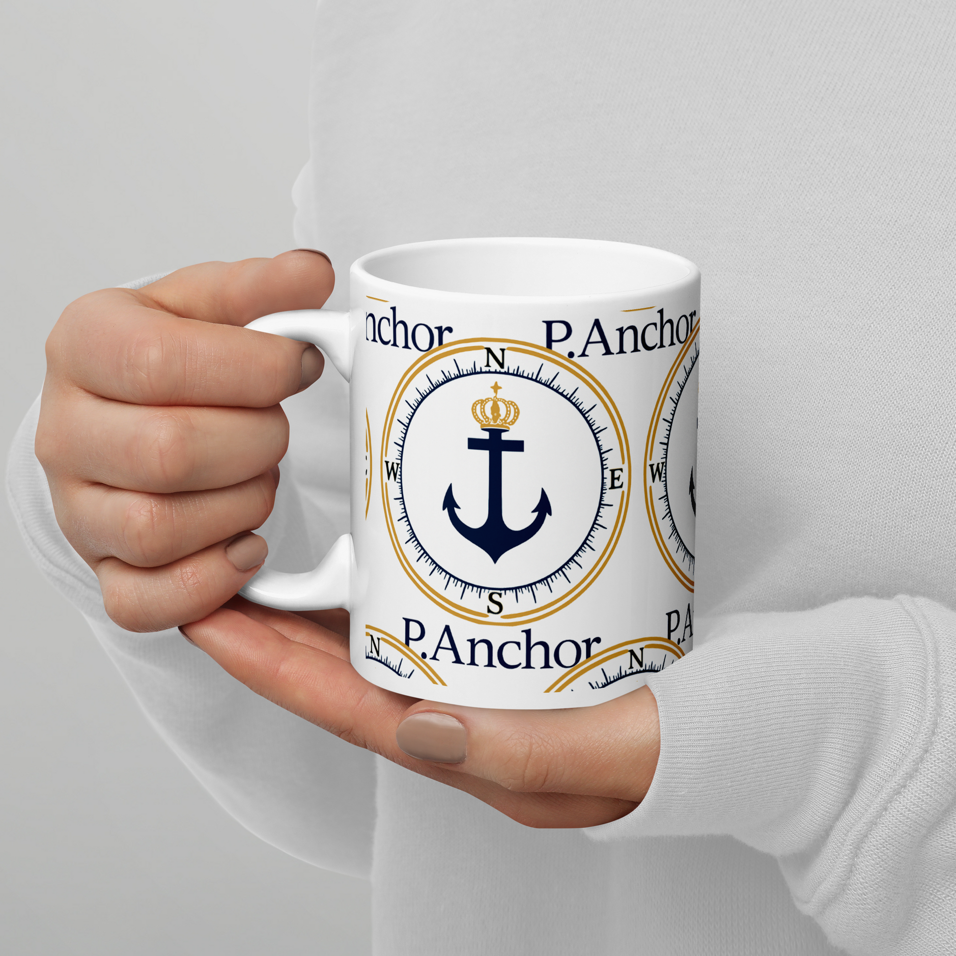 P.ANCHOR ceramic mug with nautical anchor and crown design in navy blue and gold.