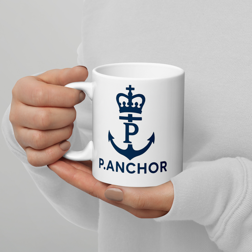 White ceramic mug P.ANCHOR with navy anchor and crown logo, nautical minimal design.