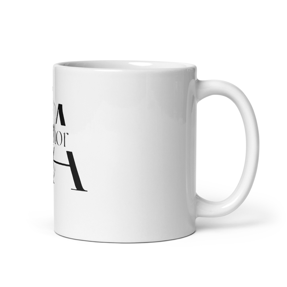 White ceramic mug P.ANCHOR with calligraphic logo and subtle nautical anchor and crown design.